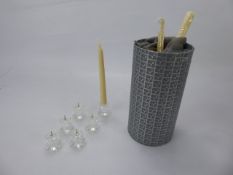 Six Swarovski Crystal Taper Candle Stick Mounts, with a quantity of taper candles.