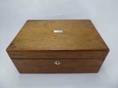 A Mahogany Writing Box, with mother of pearl inlay and lock plate.