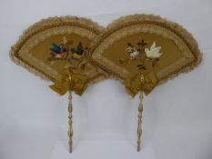 Two Regency Hand-Embroidered Silk Face-Screens, the screens having feathered work depicting birds.