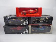 A Quantity of 1:18 Scale Die Cast Formula I Cars, including Ferrari (Irvine), Ford, McLaren, Renault