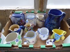 Miscellaneous Miniature Ceramic Jugs, approx 15, hand-painted in various styles.