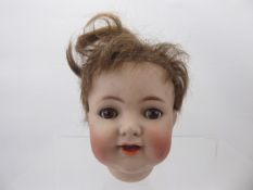 A German Simon & Halbig Bisque Headed Doll, composite limbs, sleeping eyes, nr 126. (af)