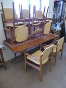 A 20th Century Retro Danish Designer Teak Dining Room Set, comprising of an oval extendable dining