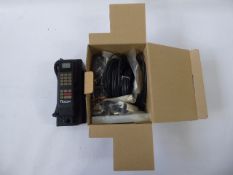 A 1980's First Edition British Telecom Mobile Phone, with accessories in the original box, unused.