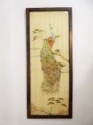A Victorian Fine Embroidery on Moire Silk, depicting a peacock seated on a branch, framed and