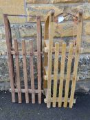 Two Vintage Wooden Sleds. with cast iron runners.