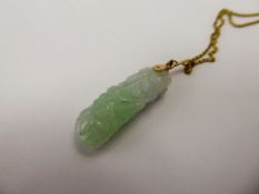 A Chinese White and Green Jade Flower Carved Pendant on 18 ct chain, approx wt. of chain and loop