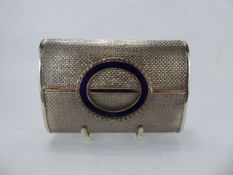 A Lady's Italian White Metal Mesh Clutch Bag. The bag having a midnight blue enamel clasp, approx