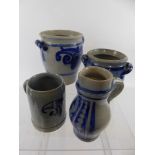 A Quantity of Westerwald Style German Pottery, including two large jars, four ale jugs and a