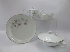 A Noritake Dinner Set, comprising eleven dinner plates, eight large side plates, eleven small side