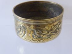 An Antique Chinese Brass Bowl, depicting chasing dragons, approx 14 cms dia x 8 cms deep.