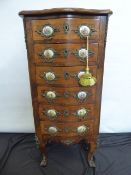 A Louis XV-Style Serpentine-Fronted Miniature Chest of Drawers, with six drawers, the chest having