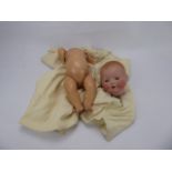 Armand & Marseilles Bisque Headed Doll, sleeping infant with open mouth revealing two teeth, with