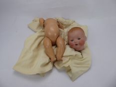 Armand & Marseilles Bisque Headed Doll, sleeping infant with open mouth revealing two teeth, with