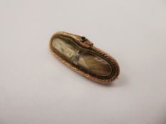 An Antique 9 ct Yellow Gold Snake Design Pendant / Mourning Brooch, the snake having an emerald