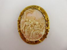 An Antique Shell Cameo Brooch, carved with figural scene, approx 6 x 5 cms, contained within a