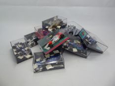 A Quantity of 1:43 Scale Die Cast Miniature Champion Cars, including Ferrari (Irvine), Williams 1997