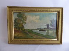 An Oil on Canvas, depicting a Dutch Barge, signed Phillips lower left, approx 41 x 26 cms together