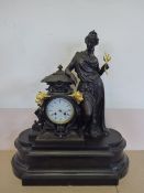 A Late 19th Century French Bronze and Black Marble Figural Mantel Clock, the dial and movement