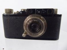 An Ernst Leitz Leica I (C) Wetzlar D.R.P Camera, nr 106917, black body with Leitz Elmar 1:35 F 50 mm