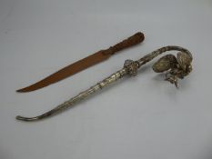 A Vintage Indian Hand-Carved Wooden Letter Opener depicting a Ganesh head together with a vintage