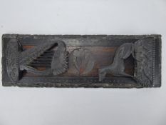 A Cornelius Goggin Irish Bog Oak Book Slide, carved with scrolling shamrocks, with Celtic Harp &