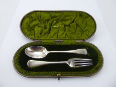 A Silver Christening Spoon and fork set in the original box. London hall mark, dated 1910, mm R.S,