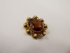 An Antique 15ct Yellow Stone and Pearl Brooch, approx wt. 5.2 gms, 8 x 2.5 mm seed pearls, quartz 16