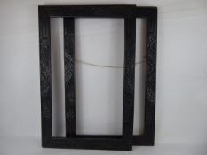 Two Matching Japanese Carved Ebonised Wooden Picture Frames, depicting chrysanthemums, approx 70.5 x