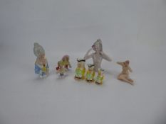 Miscellaneous Porcelain, including bisque bathing beauty, Denton toby's, two miniature pin busts,