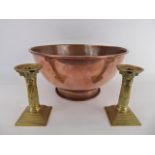 A Large Victorian Copper Mixing Bowl approx 38 cms dia, together with two brass candle sticks,