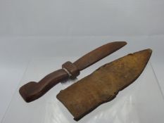 An African Wooden Child's Replica Hunting Knife in hand-stitched hide sheath, approx 29 cms (without