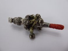 A Victorian Silver Rattle with carved coral handle., mm I.H