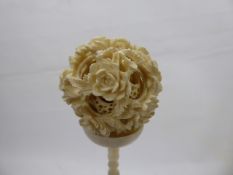 A Pre-1947 Chinese Ivory Puzzle Ball on Stand, approx 20 cms.