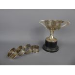 A Silver Trophy Cup, together with four silver napkin rings, all Birmingham hallmark, various date