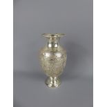 An Antique Silver Persian Vase, ovoid shape with flared neck over the shoulders. Chased and engraved