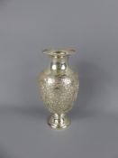 An Antique Silver Persian Vase, ovoid shape with flared neck over the shoulders. Chased and engraved