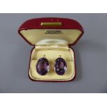 A Pair of Vintage Lady's 9ct Gold and Amethyst Clip Earrings, Sheffield hallmark dd 1976, mm A.R.P.,