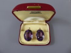 A Pair of Vintage Lady's 9ct Gold and Amethyst Clip Earrings, Sheffield hallmark dd 1976, mm A.R.P.,