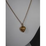 A 9ct Yellow Gold Necklace and yellow metal heart pendant, chain wt approx 2.2 gms.