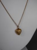 A 9ct Yellow Gold Necklace and yellow metal heart pendant, chain wt approx 2.2 gms.