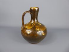 A Winchcombe Pottery Stoneware brown and yellow-decorated glazed flagon, potted by Ray Finch between