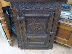 An Antique Oak Corner Cupboard, approx 62 x 18 x 30 cms. 473.