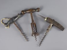 Three Vintage Corkscrews, two with wooden handles and the other with horn.