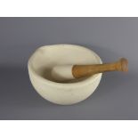 A Stone Pestle and Mortar, approx 11 x 21 dia. cms.