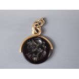An Antique Roman-Style Deep Red Double Sided Cameo Fob on 9ct mount. The cameo depicting Roman