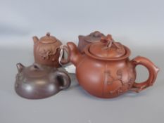 Eight Chinese Yixing Miniature Terracotta Teapots.