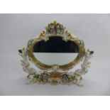 An Antique Italian Capodimonte Naples Dressing Table Mirror, embellished with gilded floral spray,