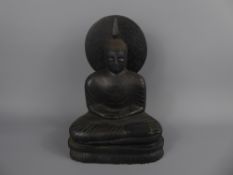 A South East Asian Ebony Carving of Buddha, depicted in the Dhyana Mudra pose, approx 28 cms