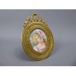 A 19th Century Portrait Miniature, entitled "Miss Ethel", in gilt effect frame, approx 5 x 4.5 cms